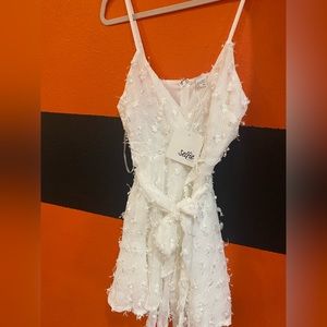 Semi formal white dress from Selfie Leslie.